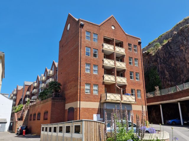 Clos du Fort (red building)